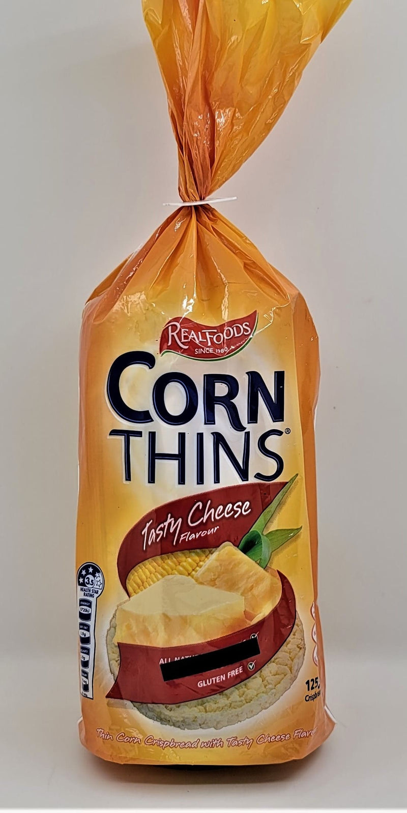 Real Foods-Corn Thins-Tasty Cheese 125g (Expiry date : 01 Jul 2025)